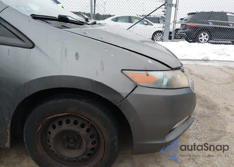 2010 Honda Insight Lx z USA, uszkodzony, nr VIN JHMZE2H57AS028046